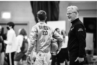 Picture By D Bryden, Phil Carson coaching Josh Bryden at the side of the piste