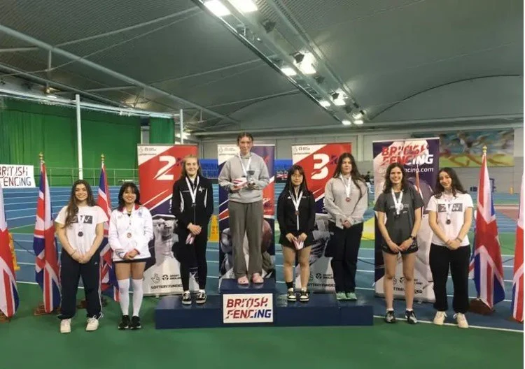 Podium picture of BYC U18 Girls Foil finalists including silver medalist Zoe Wagstaff